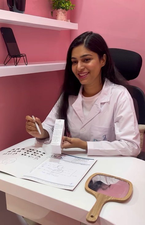 Dr. Kajal Charaniya consulting a patient at Dr. K clinic